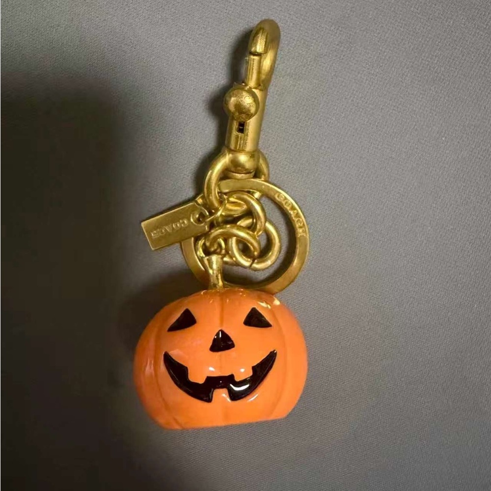 Coach Kids Pumpkin Jack-O'-Lantern Charm in Orange and Gold
